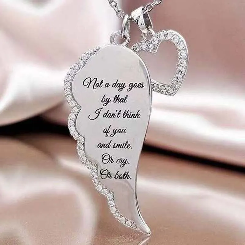 Delysia King Women&#39;s Angel Wings Love Pendant Trendy Metal Crystal Inlay Printing Hollowed Out Heart Necklace