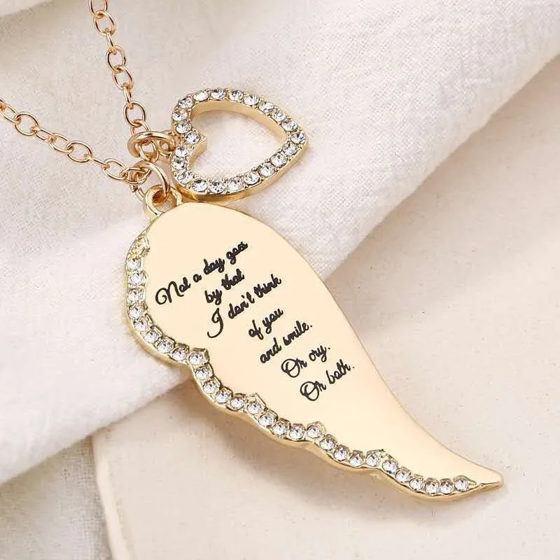 Delysia King Women&#39;s Angel Wings Love Pendant Trendy Metal Crystal Inlay Printing Hollowed Out Heart Necklace